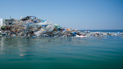 floating garbage on the sea , dirty dump in ocean