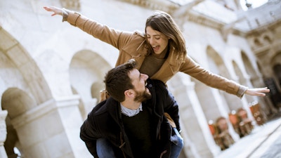 Walk of the pretty loving couple happily walking and having fun in Budapest, Hungary